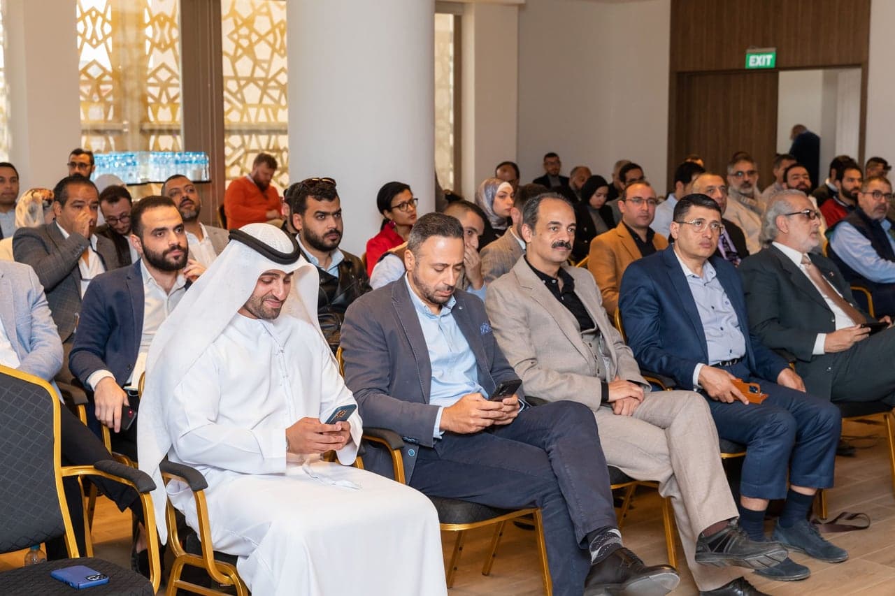 Guests listening to a speaker at Dubai Chamber's Africa FAST 100 in Cairo.