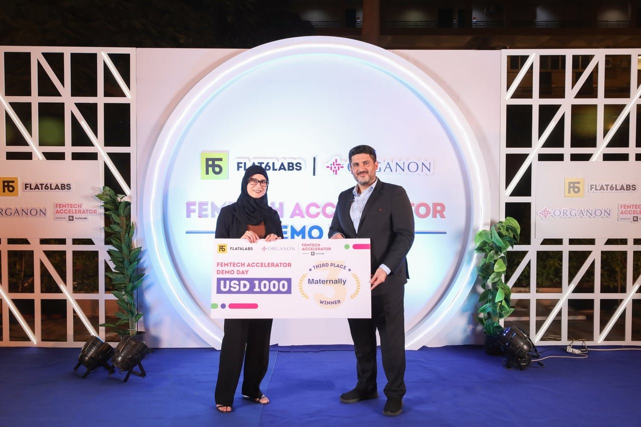 The prize cheque handed over on stage.