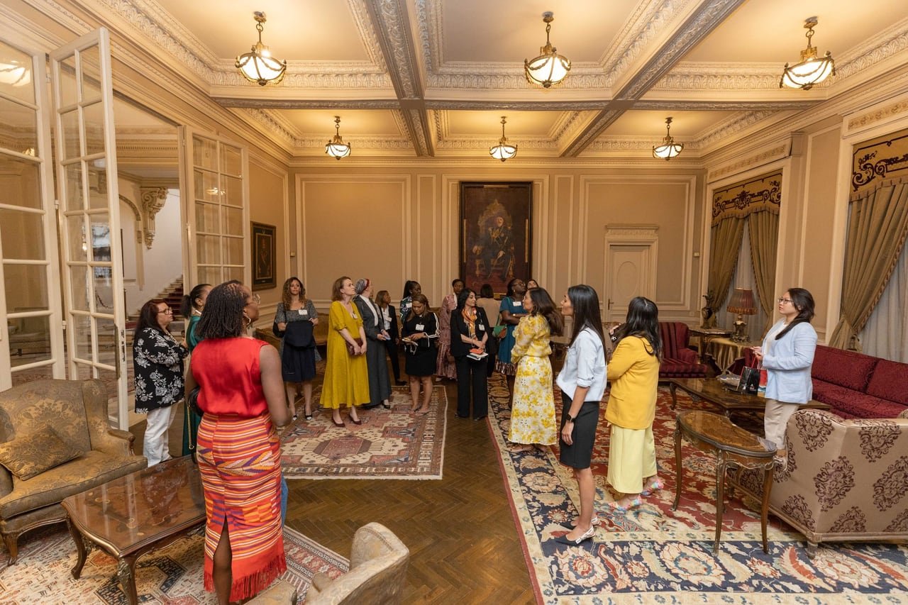 Guests arriving in the grand hall.
