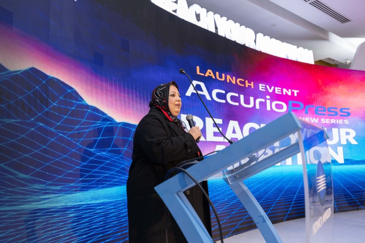 The opening speech at the podium in front of the LED wall.