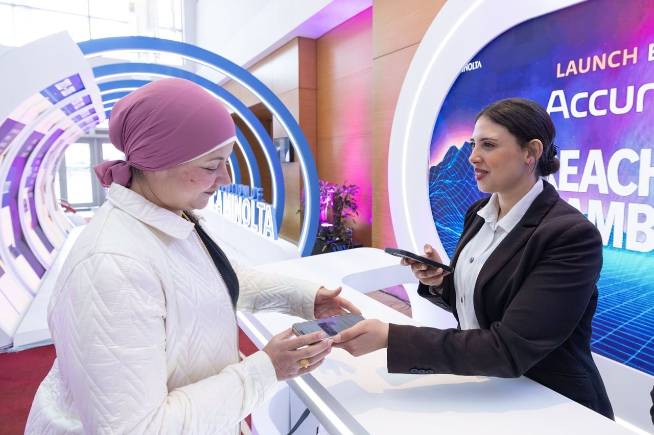 A guest registering at the welcome desk.