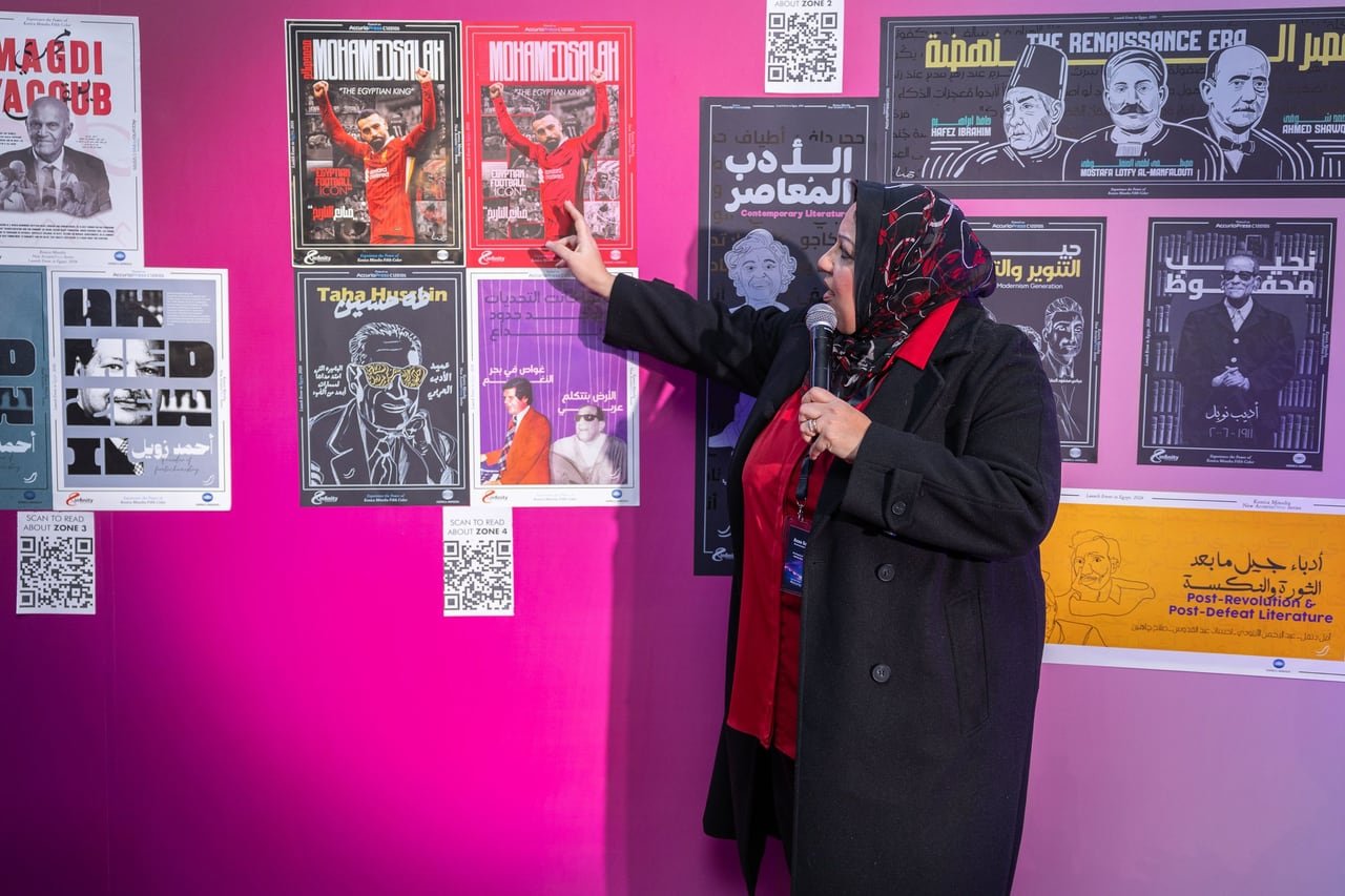 A talk at the wall of printed posters.