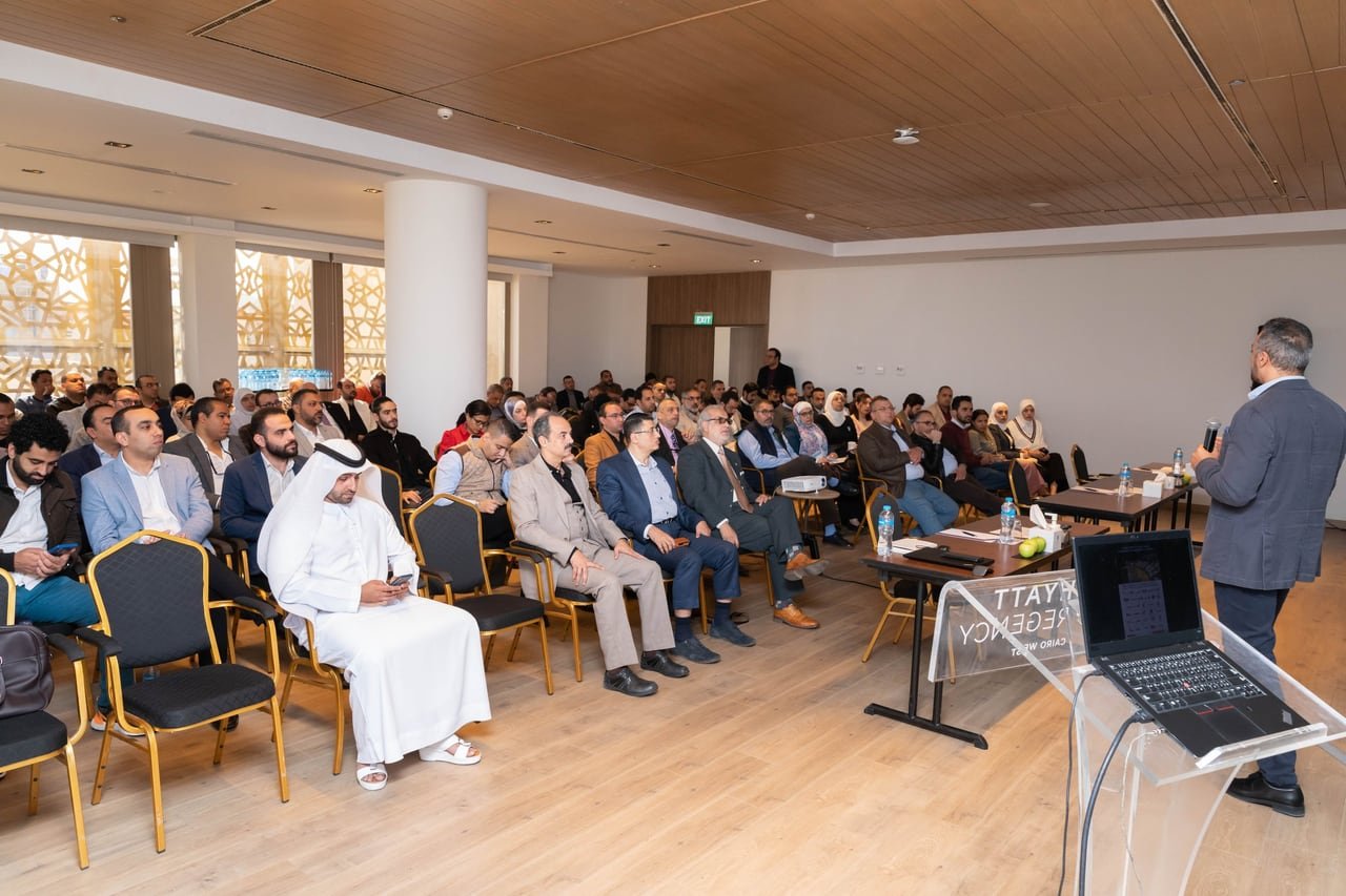 A full room at Africa FAST 100 in Cairo, with the speaker at the front.