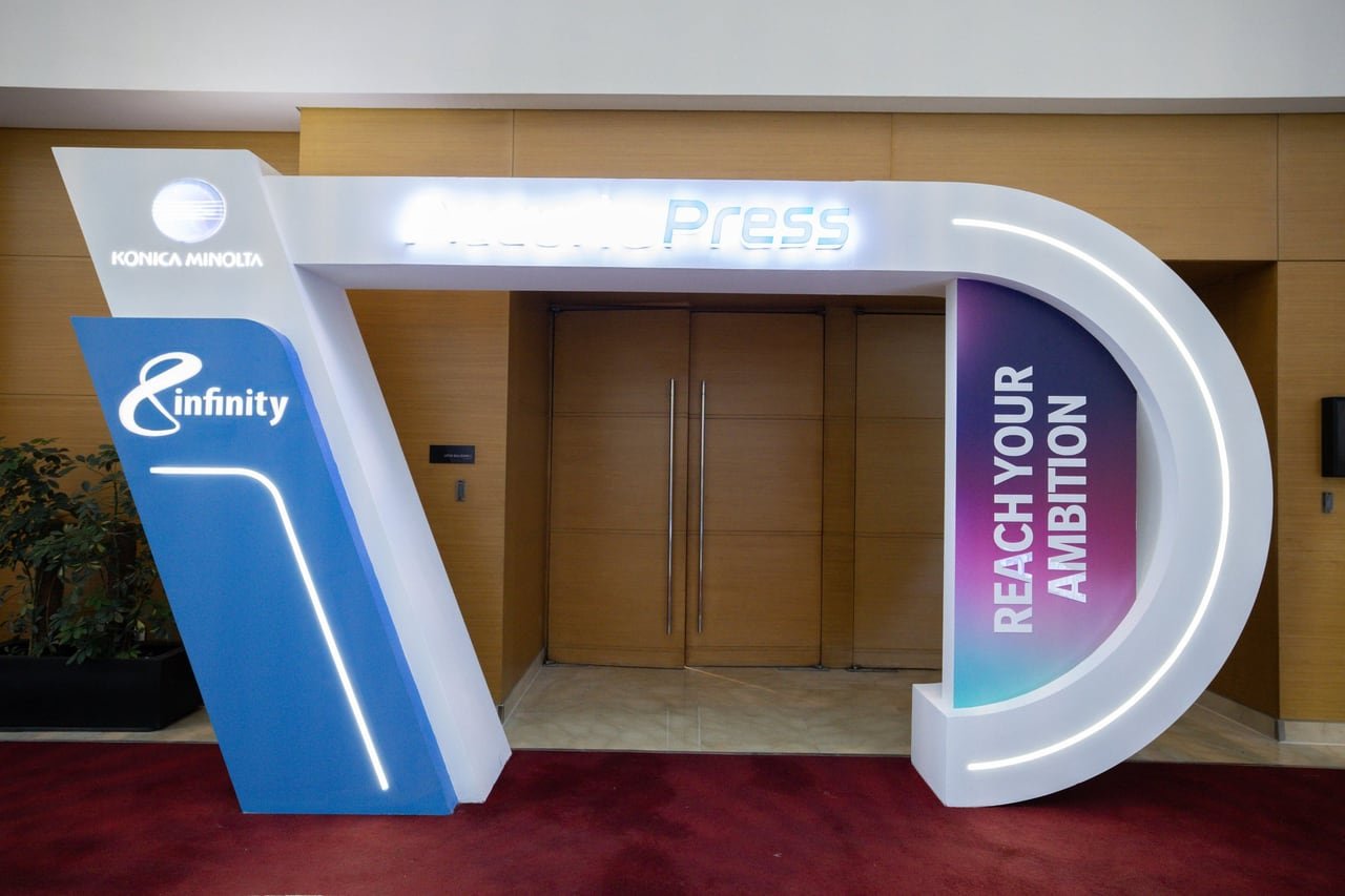 The entrance gate in Konica Minolta and Infinity branding.