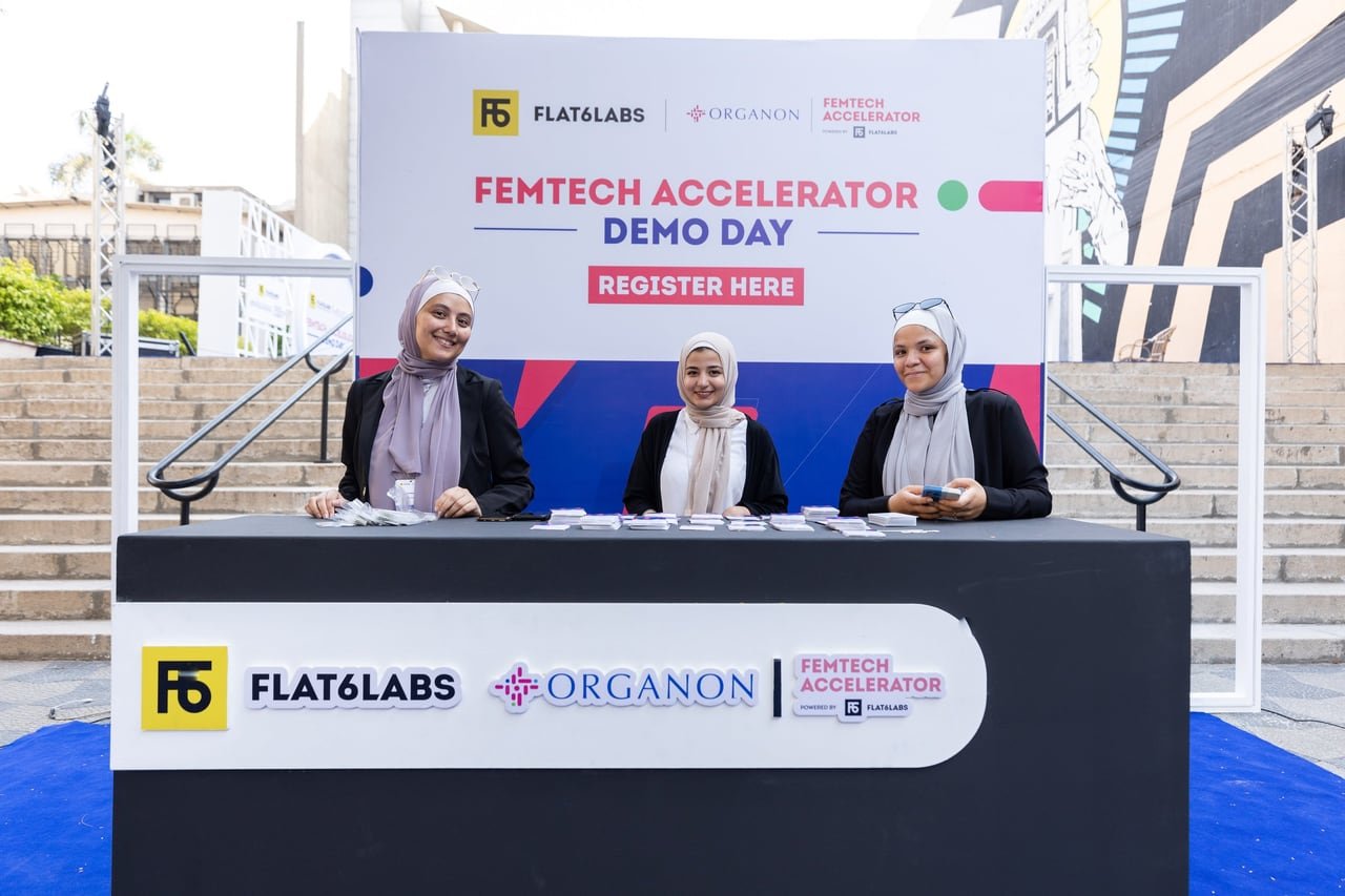 The registration team behind the Flat6Labs and Organon desk.