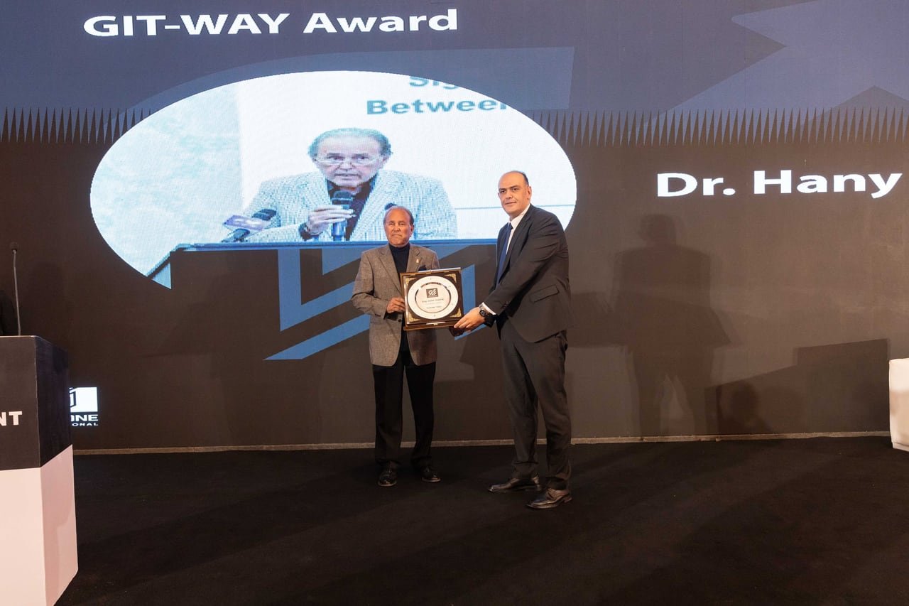 A GIT-WAY award being handed over on stage.