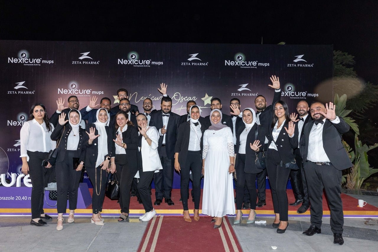 Zeta Pharma's team waving on the red carpet at Nexicure Oscar Night.